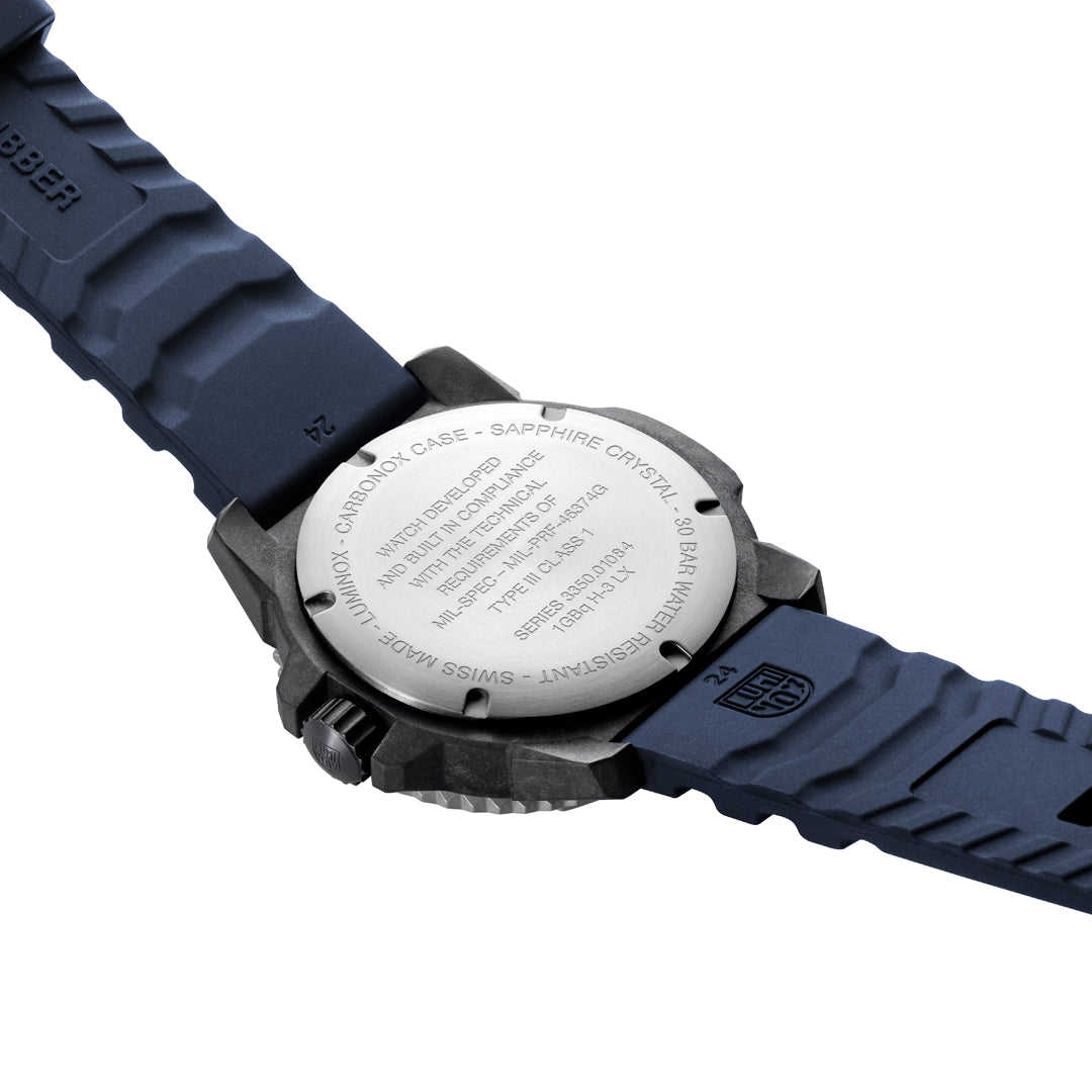 Back view of a watch with a blue strap on a white background
