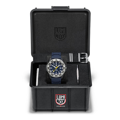 Luminox watch in a black display case on a white background