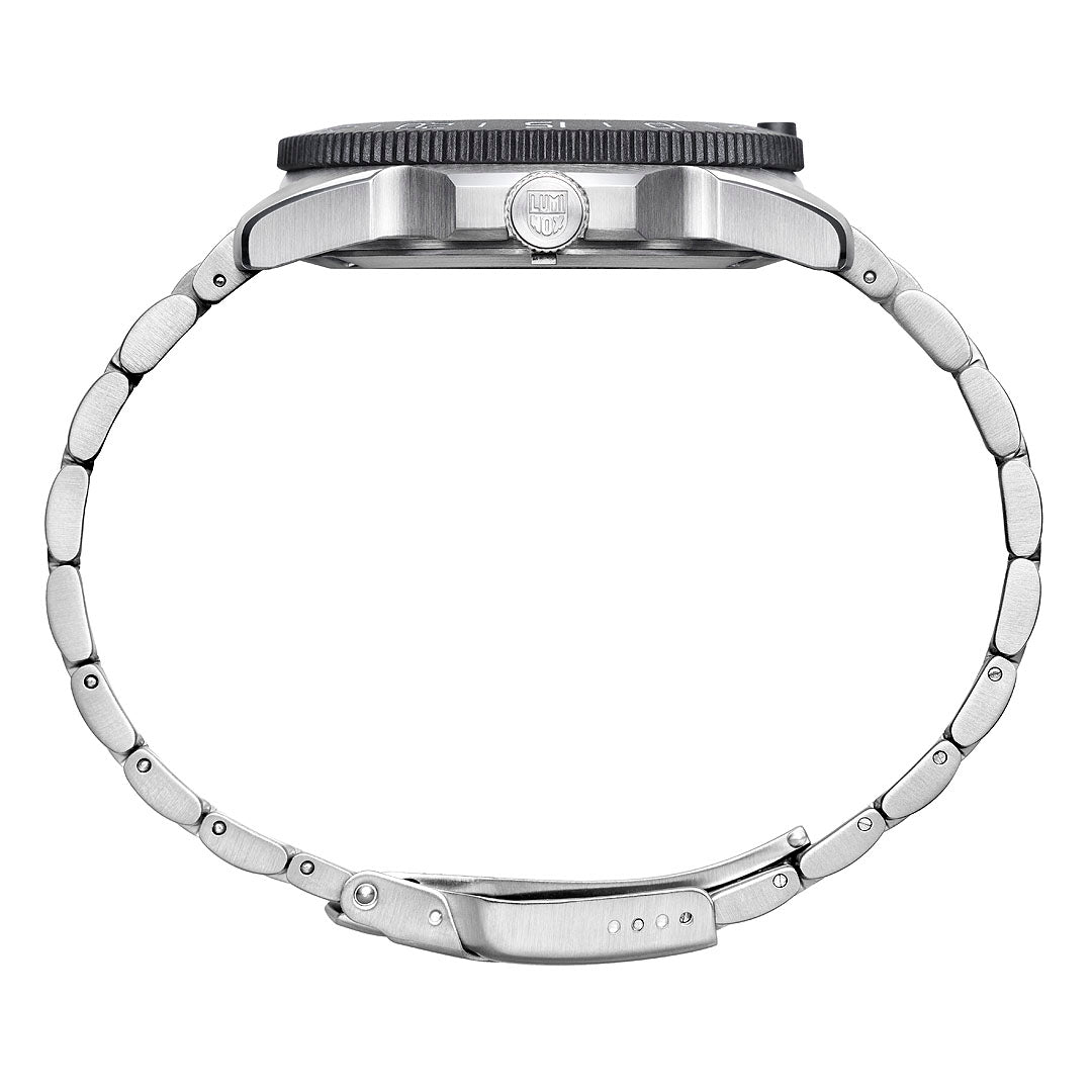 Close-up of a silver watch band on a white background